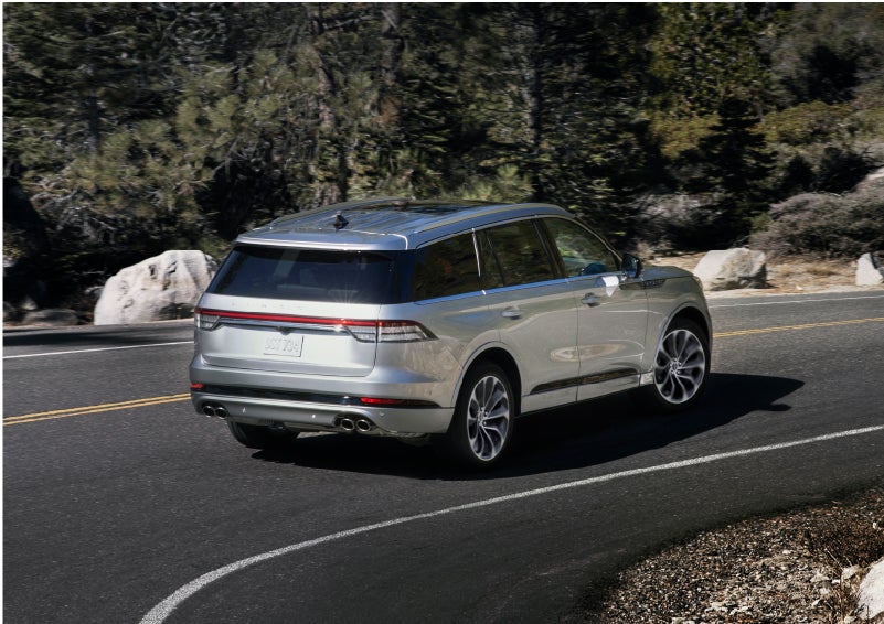 A Lincoln Aviator® is being driven on a winding road | Gates Lincoln in Richmond KY
