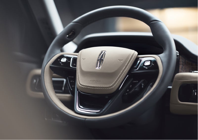 The intuitively placed controls of the steering wheel on a 2023 Lincoln Aviator® SUV | Gates Lincoln in Richmond KY