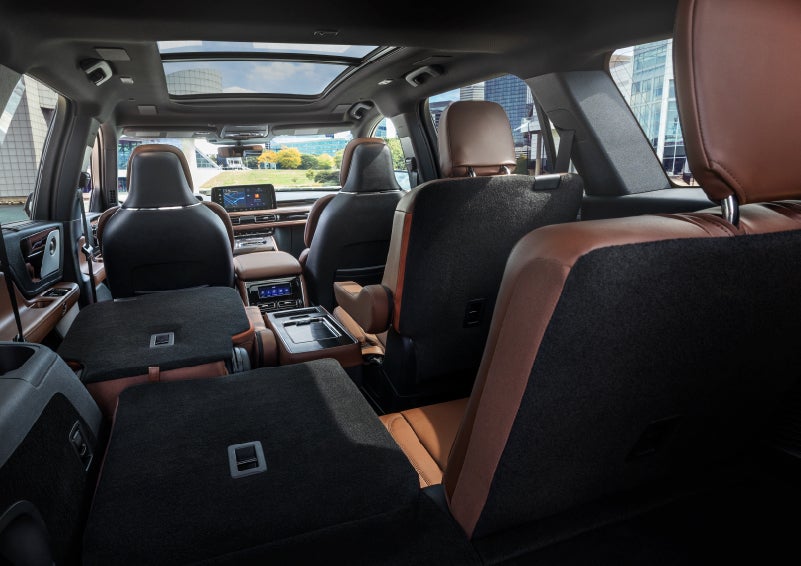 The interior of the 2025 Lincoln Aviator® SUV is shown with two seats folded down for added space. | Gates Lincoln in Richmond KY