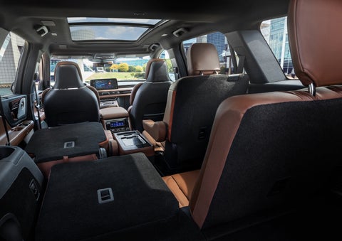 The interior of the 2025 Lincoln Aviator® SUV is shown with two seats folded down for added space. | Gates Lincoln in Richmond KY