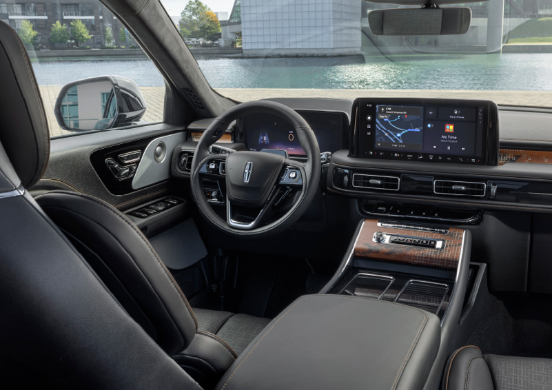 The interior of the 2025 Lincoln Aviator® SUV is shown parked with a view of a harbor through the windshield. | Gates Lincoln in Richmond KY