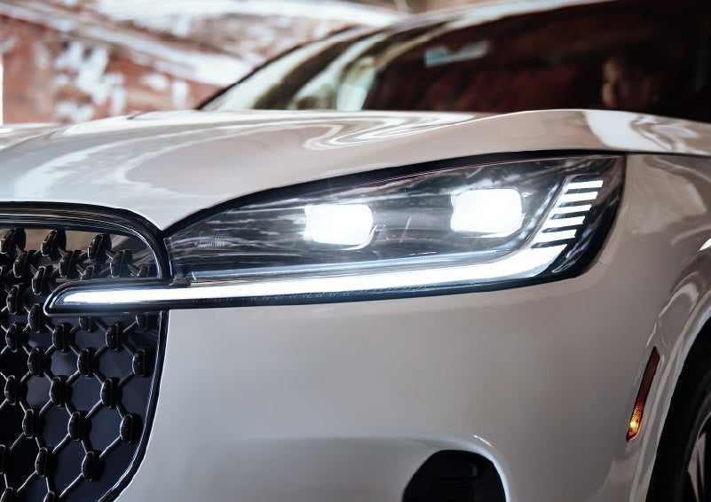 A close-up of a headlamp on the 2026 Lincoln Aviator® SUV is shown. | Gates Lincoln in Richmond KY