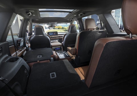 One side of the PowerFold® third-row seat and a second-row seat are folded forward in the 2026 Lincoln Aviator® SUV. | Gates Lincoln in Richmond KY