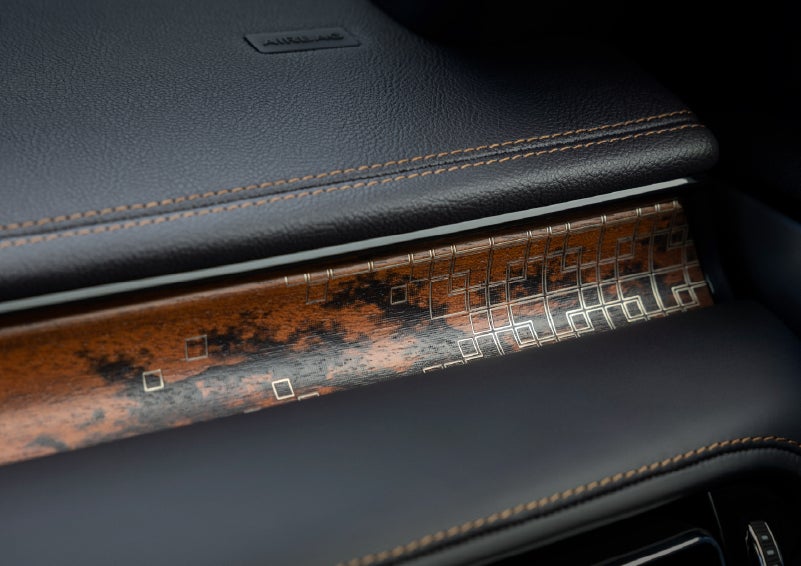 A close-up shot of the 2026 Lincoln Aviator® dashboard with unique black and brown accents and brown stitching. | Gates Lincoln in Richmond KY