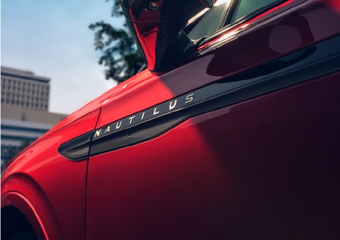 A side badge on the passenger door reads Nautilus. | Gates Lincoln in Richmond KY