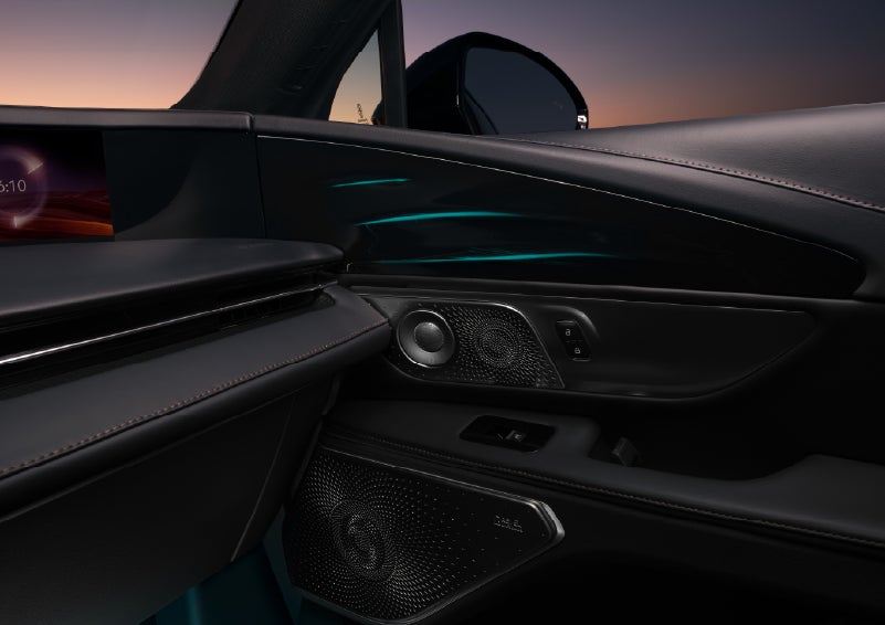 Selectable ambient lighting glows in the passenger door panel. | Gates Lincoln in Richmond KY