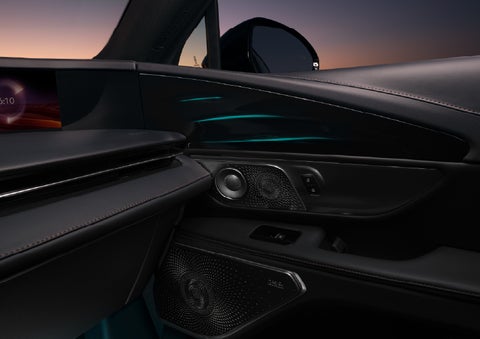 Selectable ambient lighting glows in the passenger door panel. | Gates Lincoln in Richmond KY